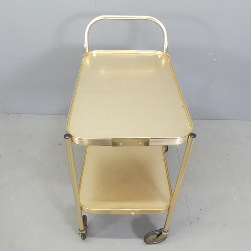 2639 - A mid-century style two-tier tea trolley, 64x76x37cm and a magazine / record rack, 57x44x44cm. (2)