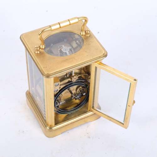 126 - A French brass-cased striking carriage clock, H11.5cm not including handle