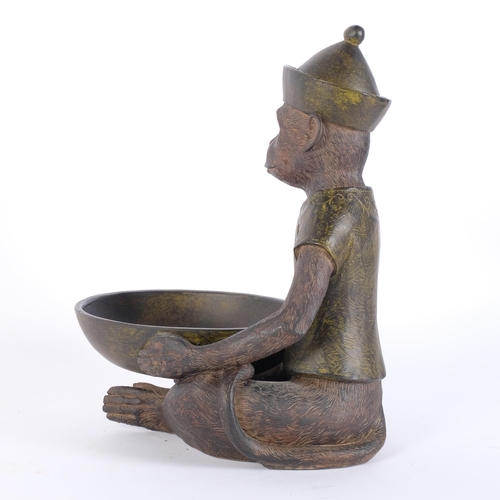 22 - A painted composite study of a monkey with begging bowl, H28cm