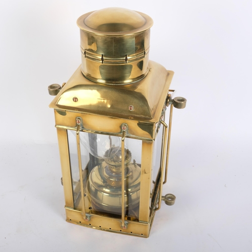 34 - A 19th century brass cargo light, no. 3954, with embossed plaque, height not including handle 38cm