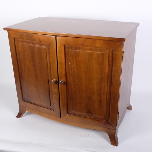 48 - A modern walnut table-top collector's cabinet, the panelled doors opening to reveal 7 fitted drawers... 