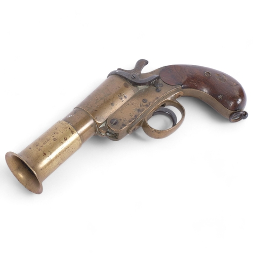 66 - WITHDRAWN - A First World War single-shot flare pistol, brass barrel and walnut handle, Cogswell & H... 