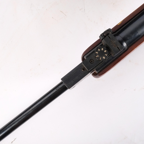 76 - A Webley Hawk Mk II .22 cal air rifle, length 105cm, with an associated stained pine case