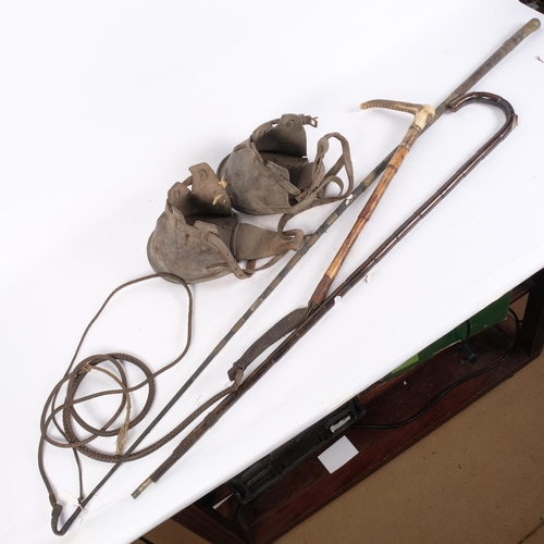 81 - A group of equine associated items, including a horse measuring walking cane, carriage whip, horn-ha... 