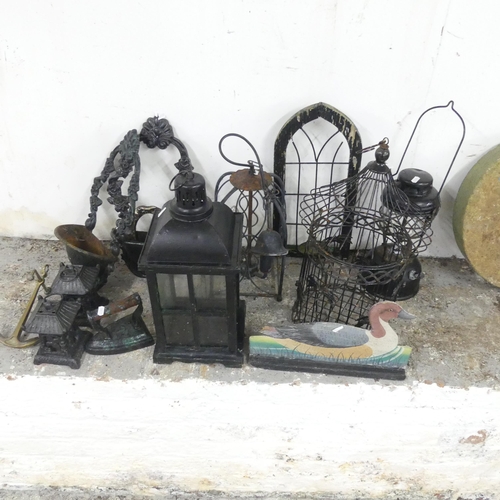 2623 - A pair of painted cast iron wall pockets, a Tilley lamp (A/F), a lantern, etc.