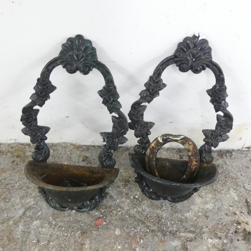 2623 - A pair of painted cast iron wall pockets, a Tilley lamp (A/F), a lantern, etc.