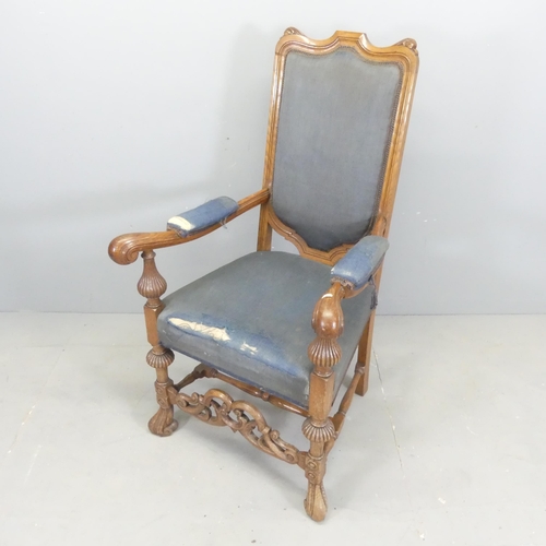 2633 - A 19th century style mahogany and upholstered open arm chair.