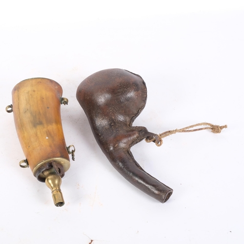 151 - An Antique buffalo horn powder flask with brass mounts, and a pressed stitch leather shot flask