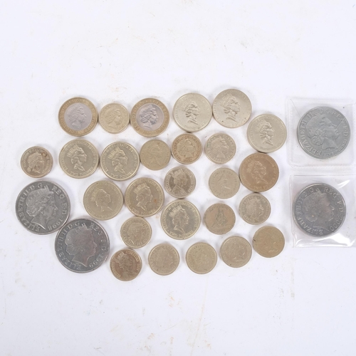 165 - A collection of English currency Collector's one pound, two pound and five pound coins (ex-circulati... 