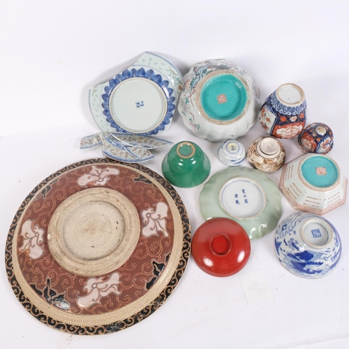 196 - A group of Oriental items, including a large enamel charger, turquoise dishes, celadon dish, Imari j... 