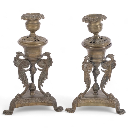 362 - A pair of ornate Antique brass candlesticks of Classical design, H19.5cm