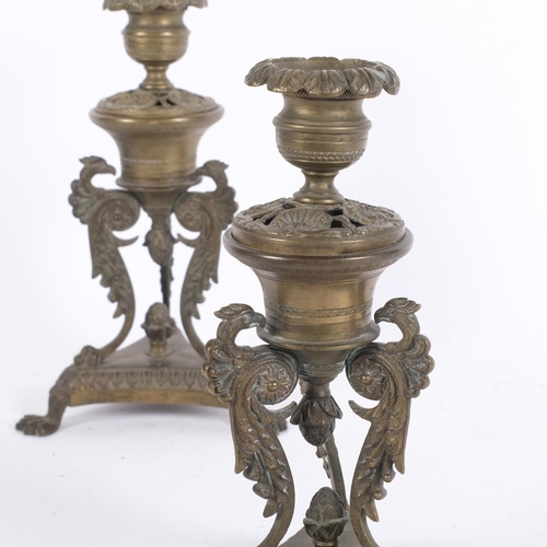 362 - A pair of ornate Antique brass candlesticks of Classical design, H19.5cm