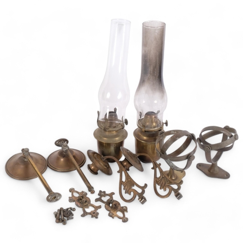 427 - 2 Antique gimballed brass oil lamps, etc