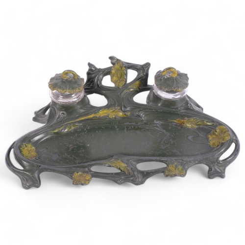 428 - Art Nouveau painted pewter Continental desk stand, with inkwells and covers, and floral design, 30.5... 