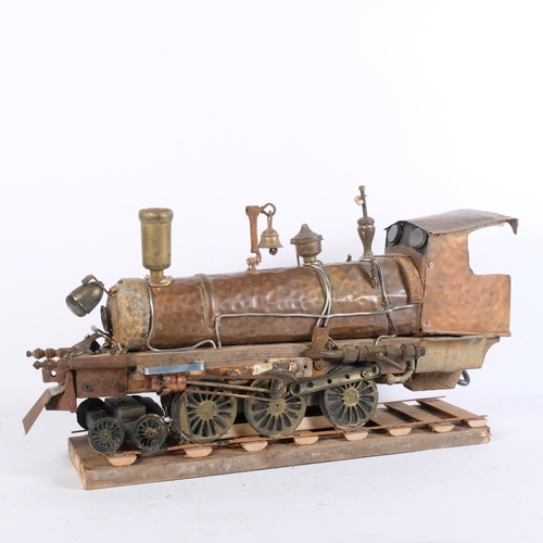 436 - Clive Fredriksson 2024, a copper and brass steampunk locomotive on wooden track, L66cm