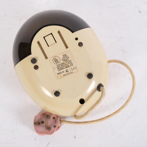 437 - A 1960s' Boston egg electric pencil sharpener with cream and brown plastic body, model #16, makers l... 