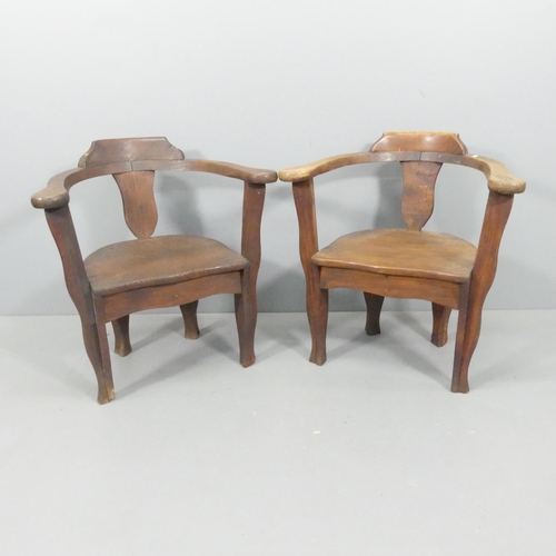 2650 - A pair of oak and pine bow-arm captain's chairs.