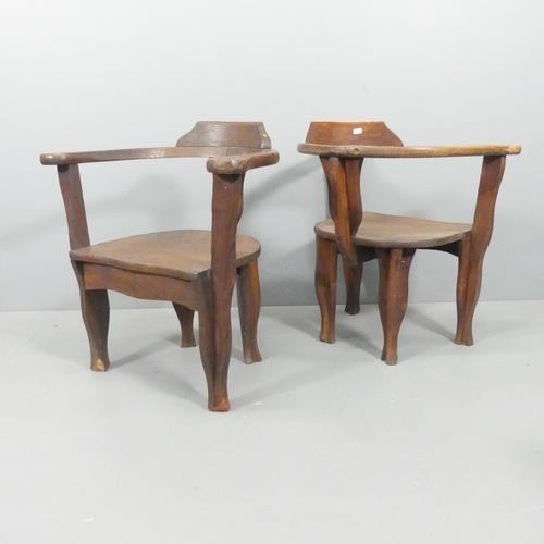 2650 - A pair of oak and pine bow-arm captain's chairs.