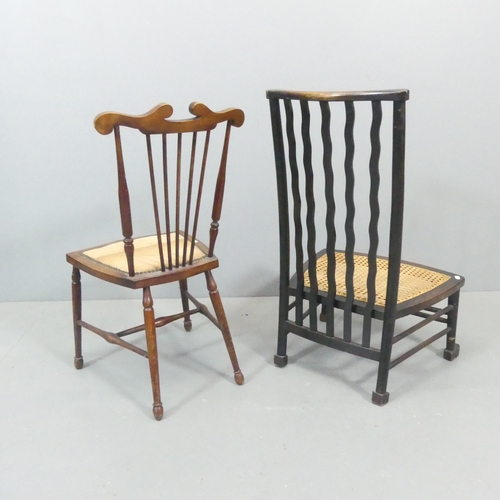 2660 - An Edwardian Arts & Crafts side chair, and a low wavy back cane-seated chair.