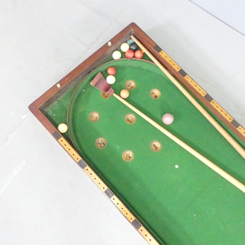 2666 - A Victorian Table Top Bagatelle Game with satin wood cup pockets, baize covered board, housed in a f... 