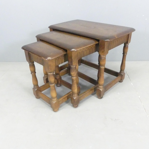 2668 - A modern nest of three oak occasional tables, largest 62x47x38cm.