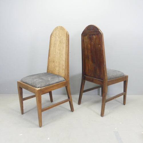 2670 - A pair of rustic Arts & Crafts style hardwood high back hall chairs, with butterfly cleated joints a... 