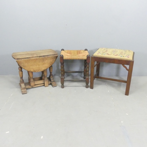 2671 - A small oak dropleaf occasional table, 56x46x28cm, a tapestry-upholstered stool and a rush-seated st... 