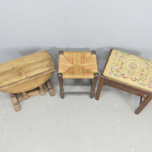 2671 - A small oak dropleaf occasional table, 56x46x28cm, a tapestry-upholstered stool and a rush-seated st... 