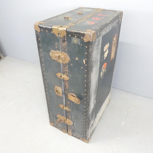 2676 - A vintage metal-bound travelling wardrobe, with label for Watajoy. Dimensons (closed) 37x93x56cm.... 