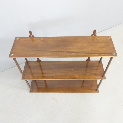 2680 - A 19th century mahogany and brass-inlaid three tier hanging shelf. 61x53x16cm.