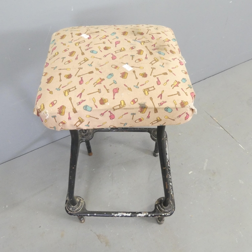 2681 - A vintage industrial stool, with tubular metal frame. Height 64cm.