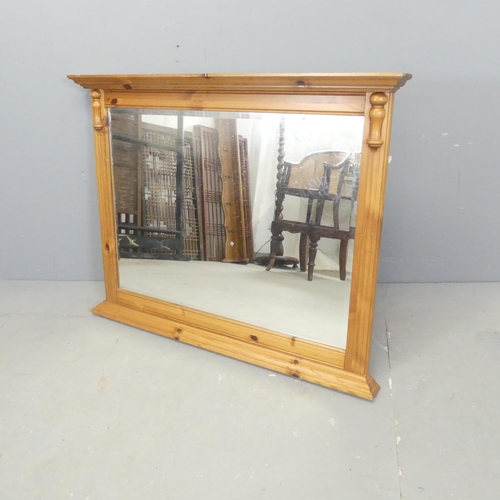 2684 - A modern pine over-mantle mirror. 95x73cm.