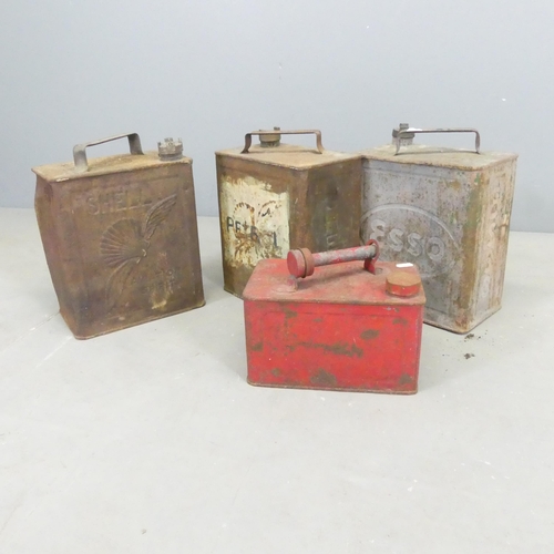 2691 - Four vintage oil cans, including Esso and Shell.