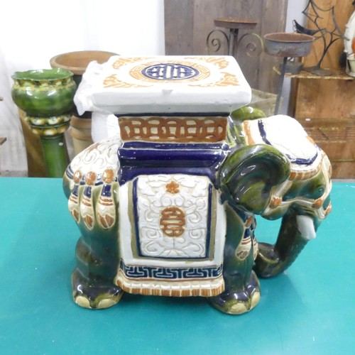 2692 - A painted ceramic elephant deisgn plant stand. 41x37x19cm