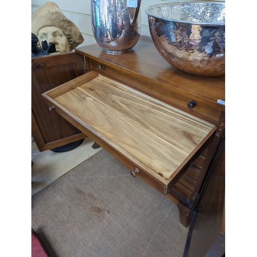 48 - A modern walnut table-top collector's cabinet, the panelled doors opening to reveal 7 fitted drawers... 