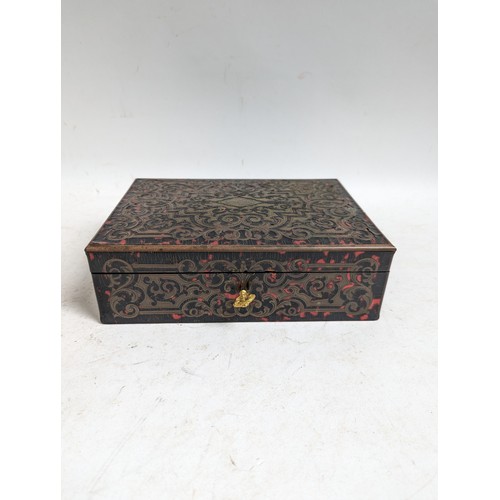 57 - A 19th century boulle-work lady's sewing box, having a blue silk fitted interior with lift-out tray,... 