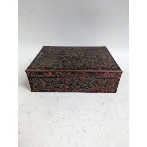 57 - A 19th century boulle-work lady's sewing box, having a blue silk fitted interior with lift-out tray,... 