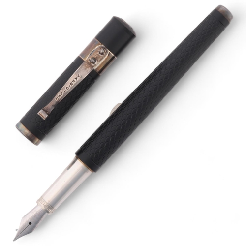 504 - A Yard-O-Led fountain pen, with black engine turned resin body, 18ct M Nib, and 2003 Birmingham hall... 