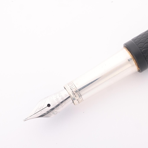 504 - A Yard-O-Led fountain pen, with black engine turned resin body, 18ct M Nib, and 2003 Birmingham hall... 