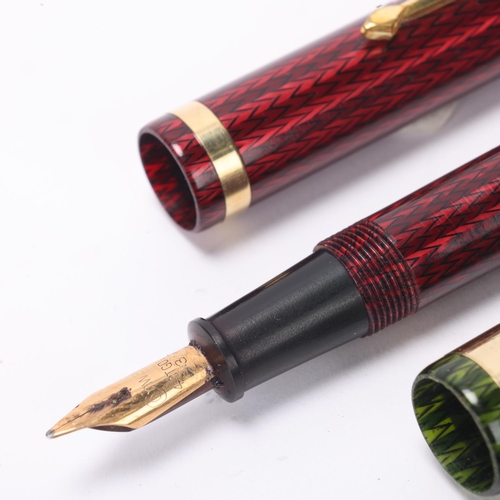 513 - 2 vintage Conway Stewart lever fill fountain pens, with 14ct nibs and herringbone lacquer bodies, ci... 