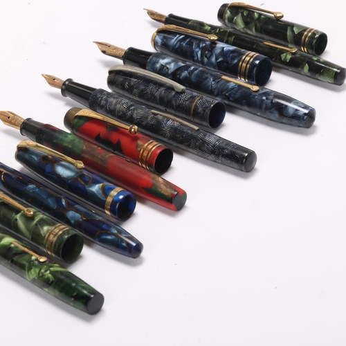 514 - 6 Vintage Conway Stewart lever fill fountain pens, all with marble resin bodies and 14ct gold nibs