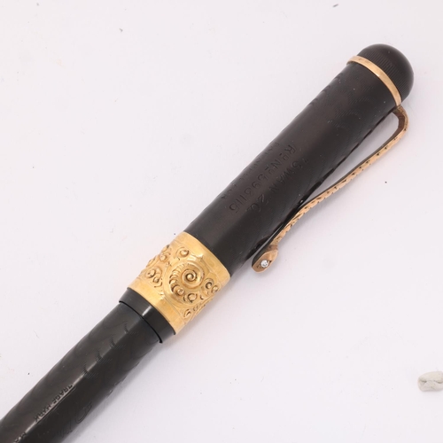 521 - A Mabie, Todd & Co, a Swan 2C Eye-dropper pen with 