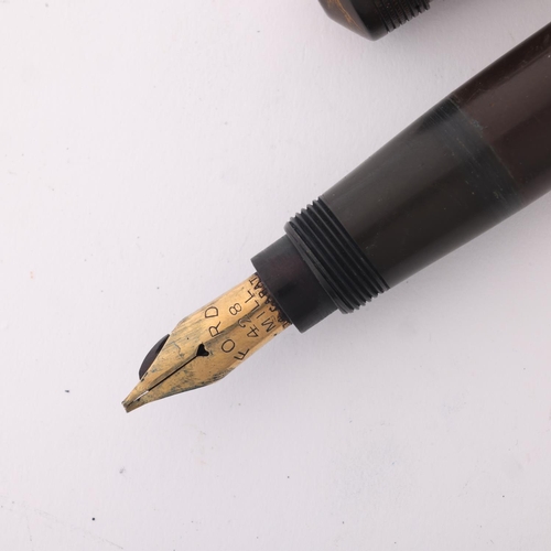 524 - A Ford's Patent fountain pen, circa 1930, black rubber body, nib marked 428 Mill, length 14.2 cm