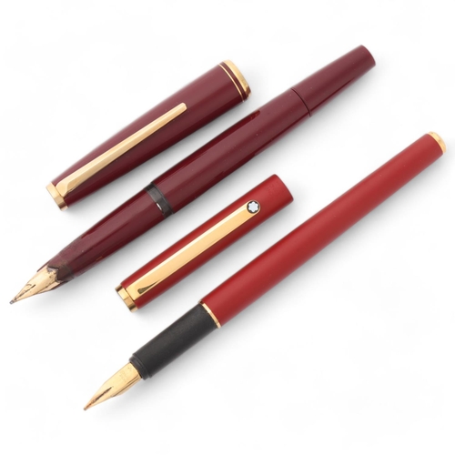 548 - A 1970s' Montblanc 221 piston fill fountain pen, with burgundy resin body and gilt metal trim, 14ct ... 