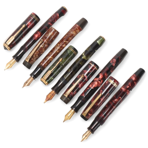 559 - 5 vintage Parker fountain pens, with marbled resin bodies lever and sprung pump 