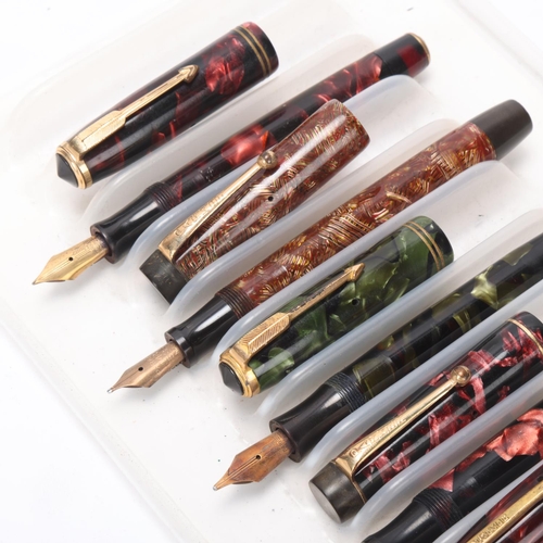 559 - 5 vintage Parker fountain pens, with marbled resin bodies lever and sprung pump 