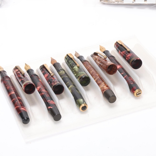 559 - 5 vintage Parker fountain pens, with marbled resin bodies lever and sprung pump 