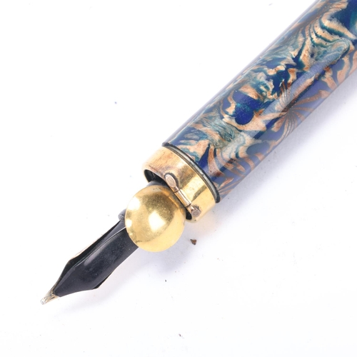 561 - A Pullman blue and gilt marbled fountain pen with 14k nib and gilt mounts, with push action pop up n... 