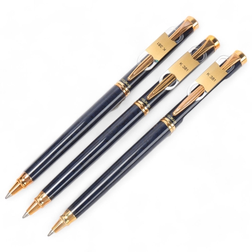 583 - 3 Pelikan model K381 ball point pens, with blue body and gilt  trim, all boxed with paper and labels