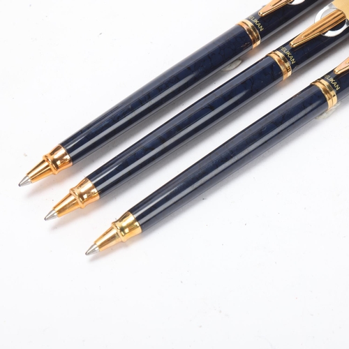 583 - 3 Pelikan model K381 ball point pens, with blue body and gilt  trim, all boxed with paper and labels